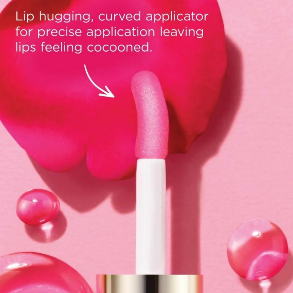 DELUXE CLARINS 04 LIP COMFORT OIL WITH SWEETBRIAR ROSE OIL.